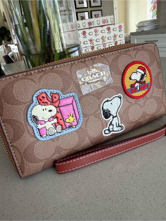 Coach Handbags - Coach signature C peanuts, snoopy zippered wallet NWOT collectors piece